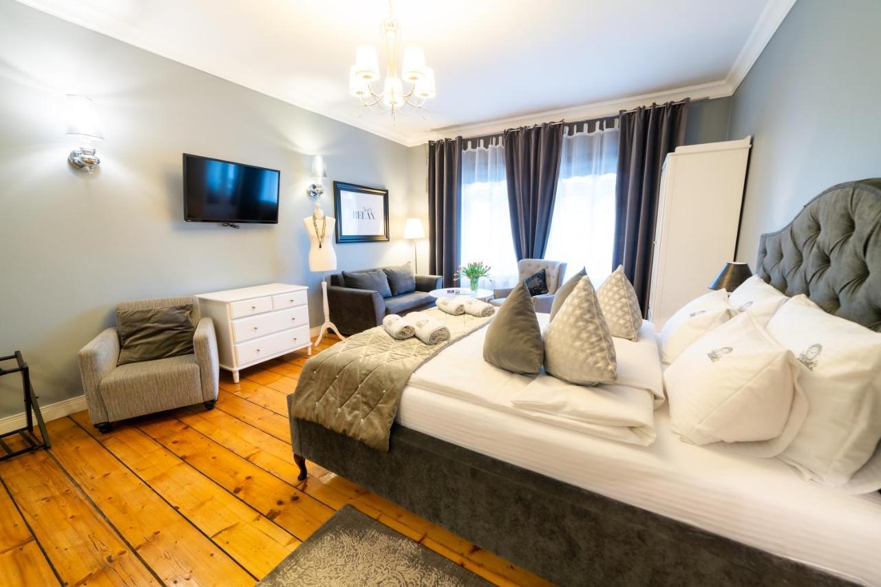 Apartamenty Pod Zegarem Mikołajki Kültér fotó