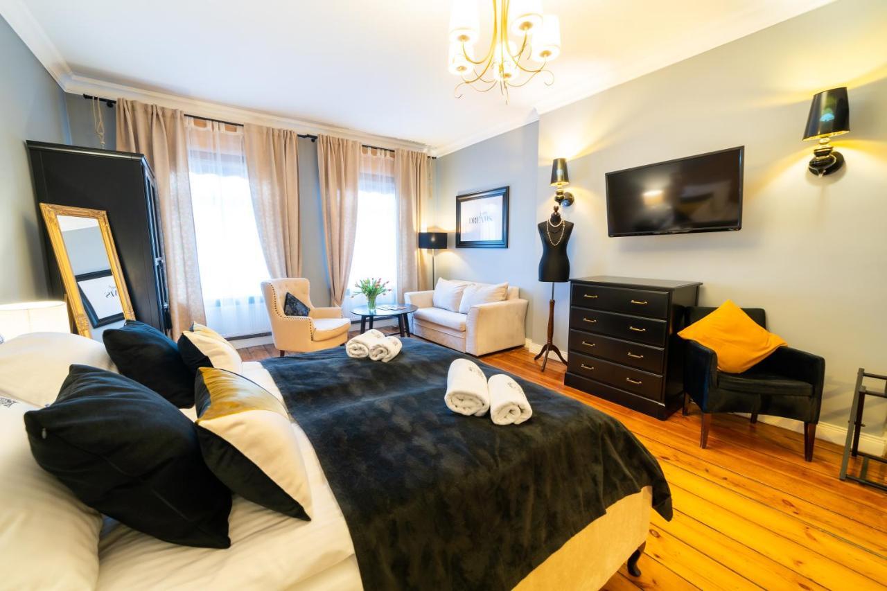 Apartamenty Pod Zegarem Mikołajki Kültér fotó